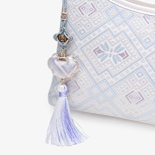 Bolsa Clutch Geométrica Lavanda com Tassel - imagem 15