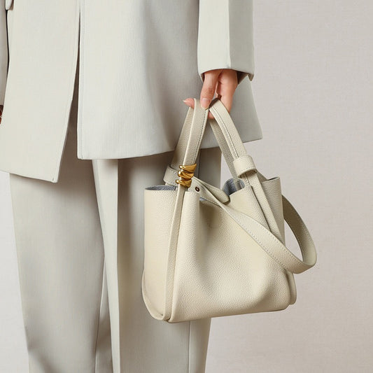 Bolsa feminina compacta Belle com visual delicado